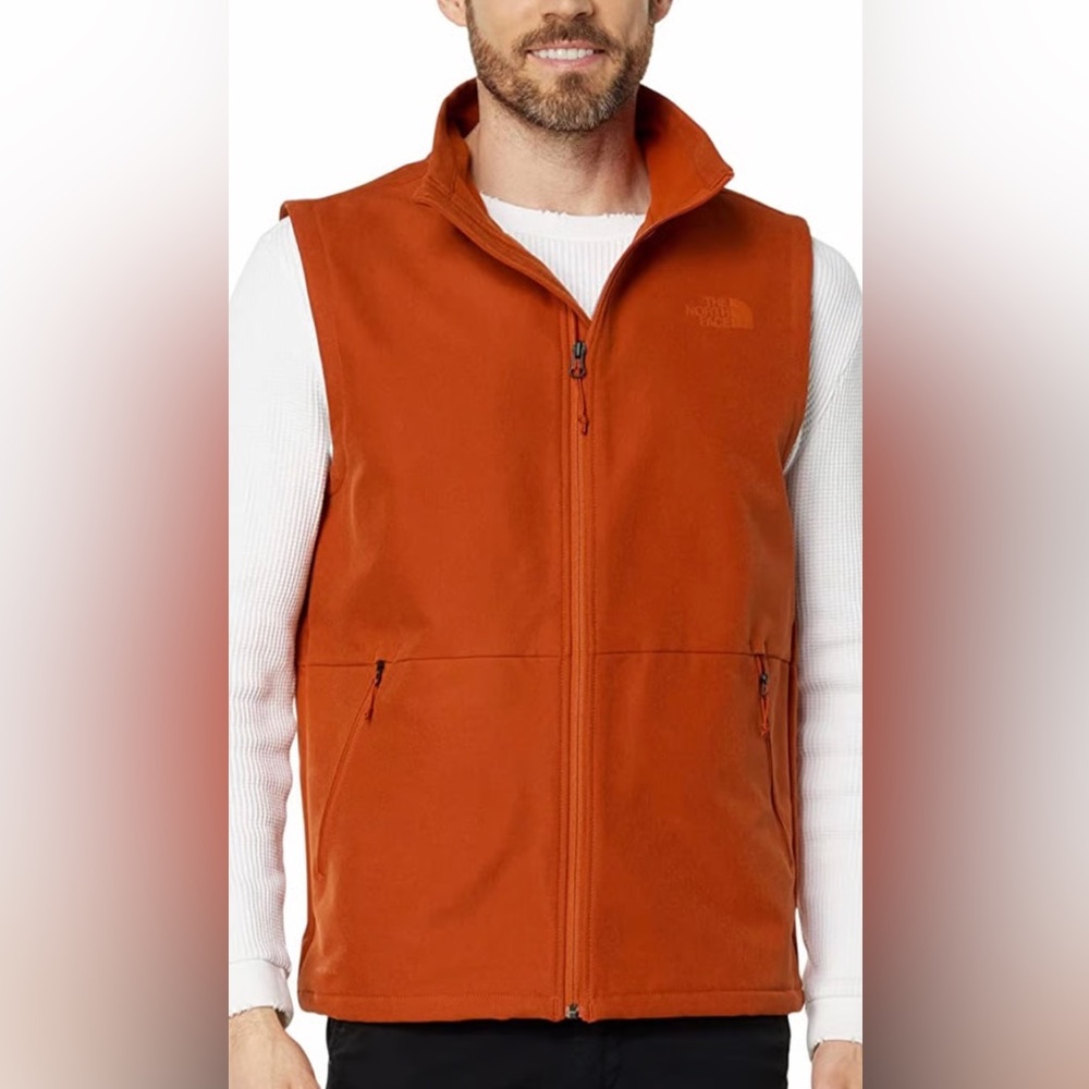 The North Face burnt orange vest